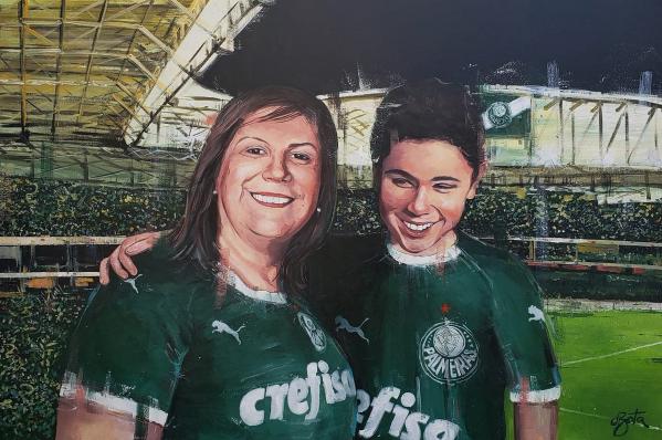 Silvia e Nickollas foram vencedores do FIFA Fan Award (Foto: Divulgação/Palmeiras)