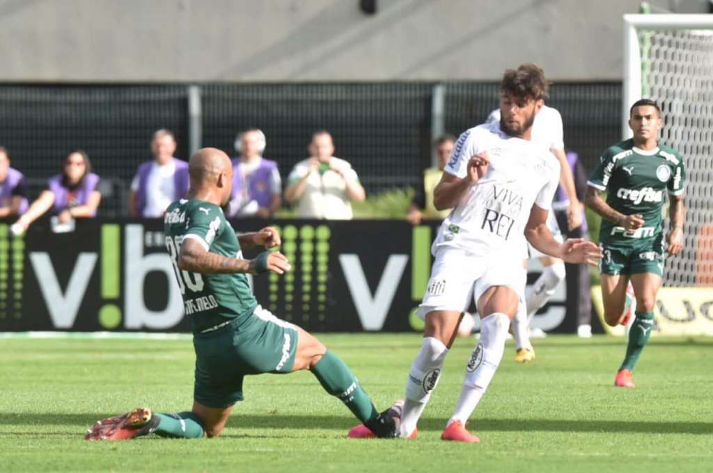 Lance em que Felipe Melo recebeu o cartão amarelo (Foto: Ivan Storti/Santos)