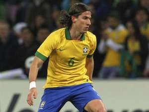 Filipe Luís conta que livro dado por Tite o incentivou na seleção