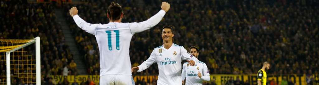 Cristiano Ronaldo e Bale comemoram a primeira vitória do Real Madrid no estádio do Borussia Dortmund