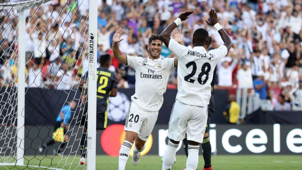 Asensio comemora seu gol com passe de Vinícius Júnior: Brasileiro mostra estrela no Real Madrid