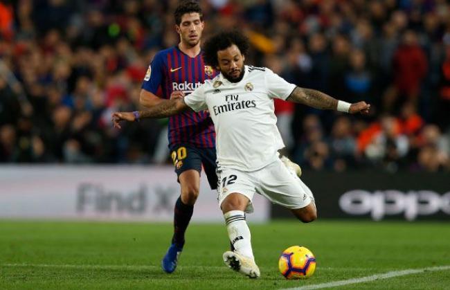 Marcelo jogou no 'sacrifício' no último domingo contra o Barcelona, quando voltou a sentir a lesão (Foto: Divulgação/Real Madrid)