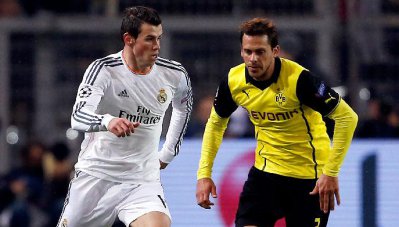 LIGA DOS CAMPEÕES: Borussia pressiona, marca dois, mas Real está classificado