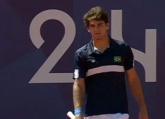 Olimpíadas: Thiago Wild é superado por Tomás Etcheverry e cai na estreia em simples