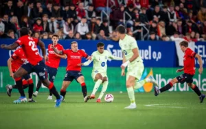 ESPANHOL: Barcelona leva 4 a 2 do Osasuna sob gritos de 'olé' e acompanha clássico de Madri pressionado